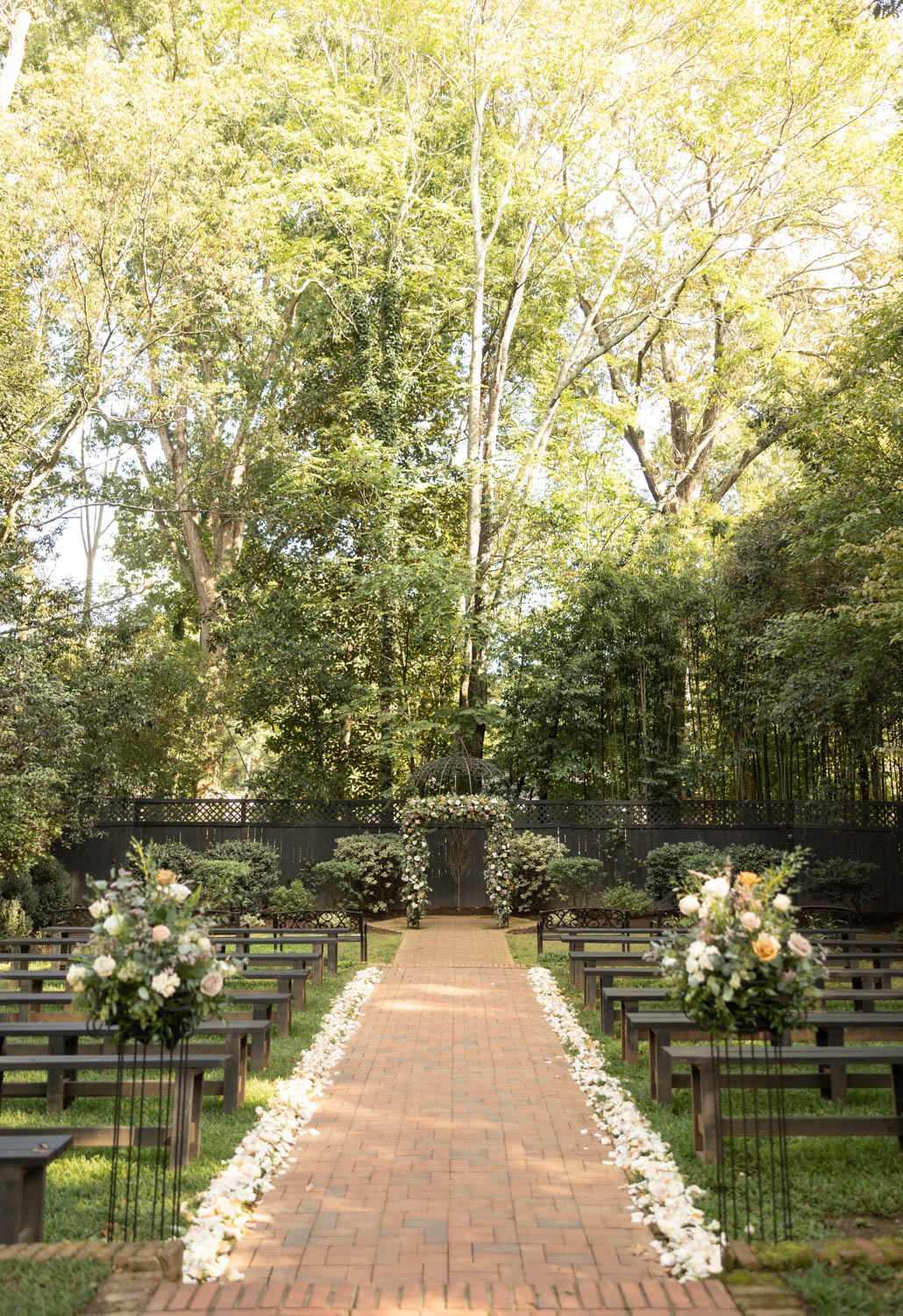 A path leading into the woods, a wedding ceremony location