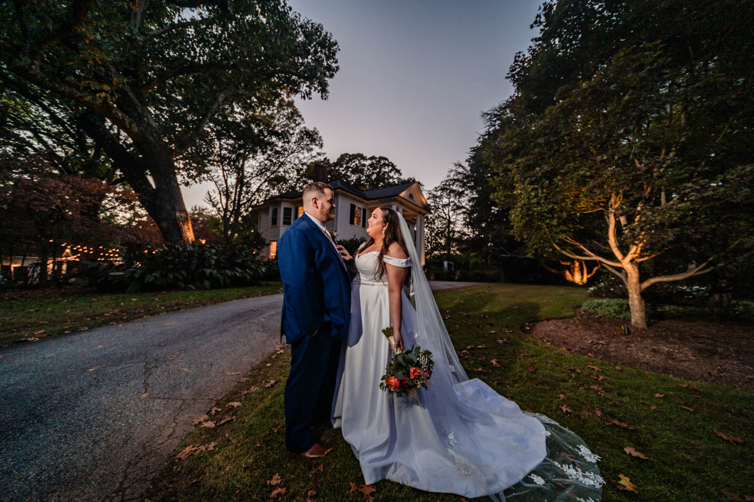 Groom and bride look at each other for wedding pictures