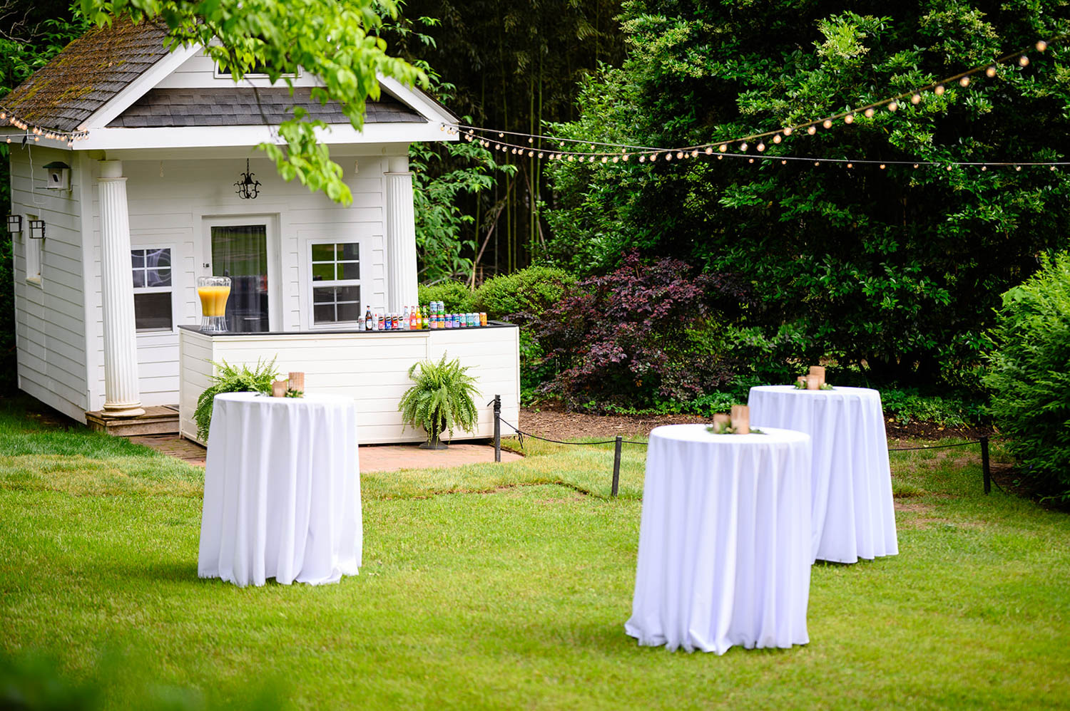 White tables set up for a reception