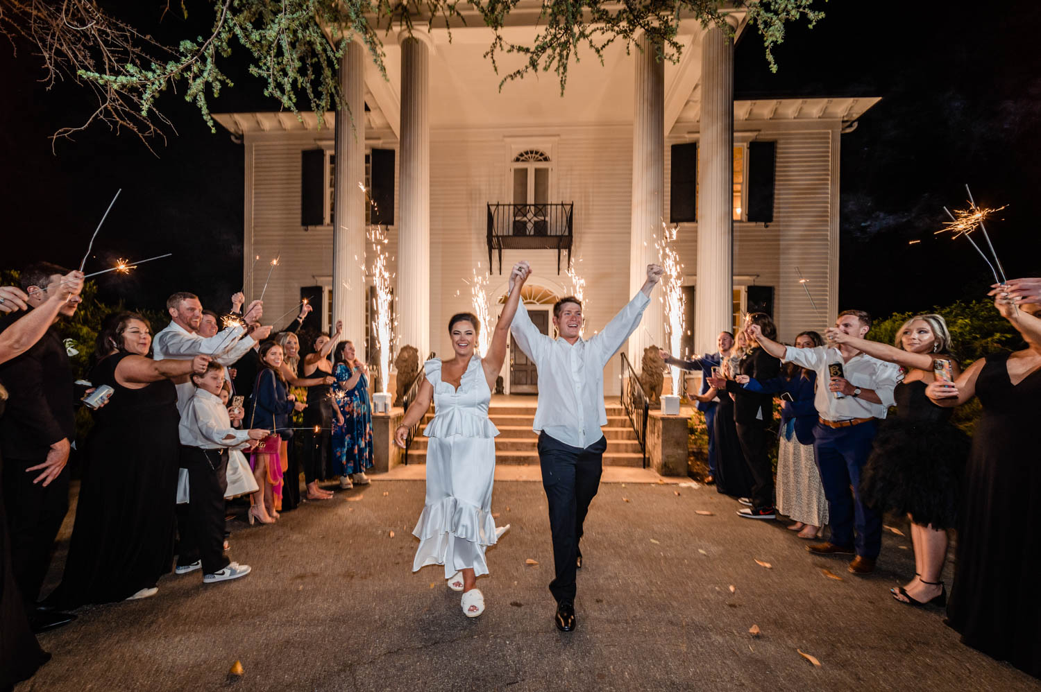 Couple leaving Duncan Estate with a sparkler exit