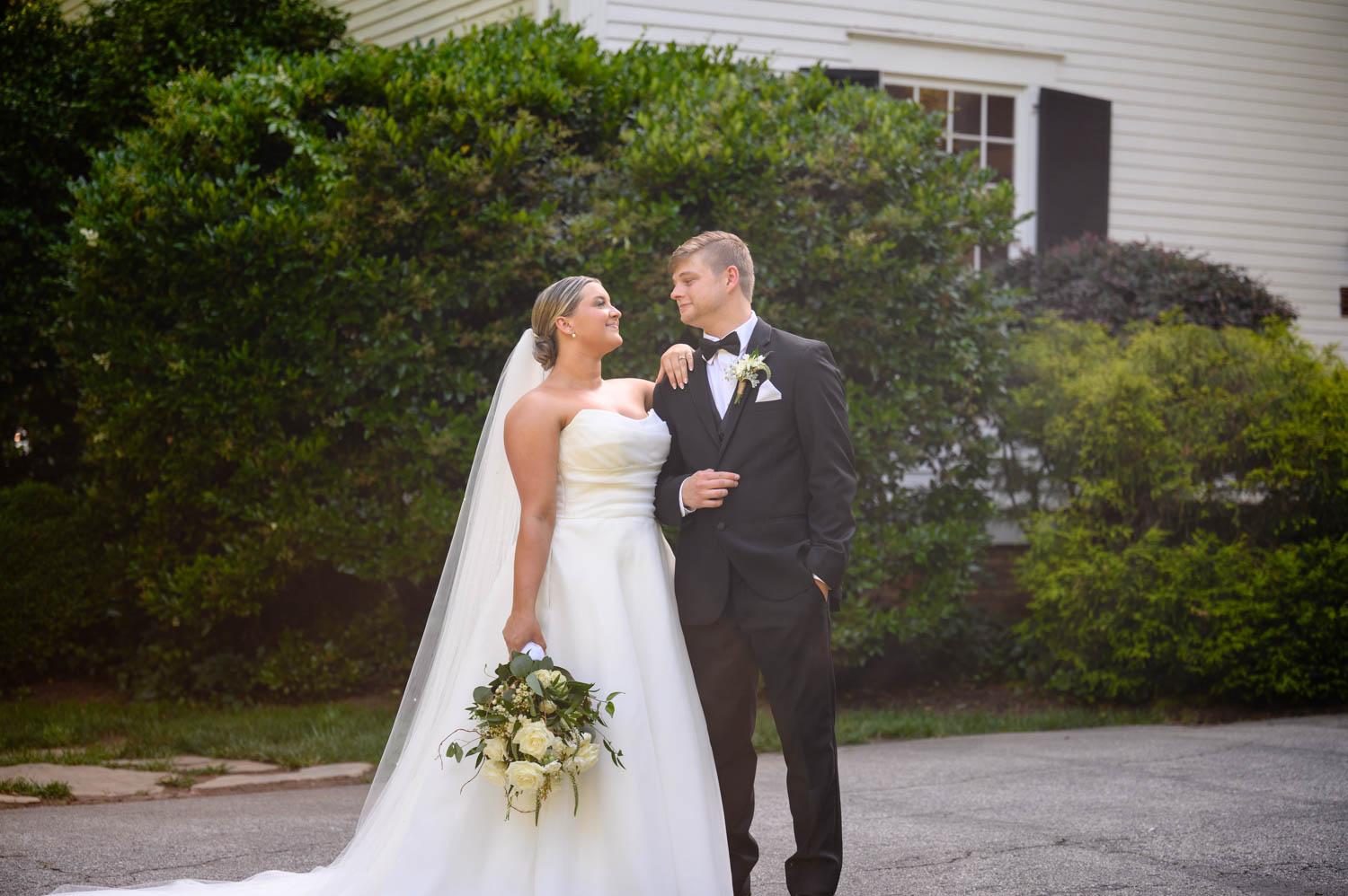 Man and woman looking at each other after their wedding ceremony