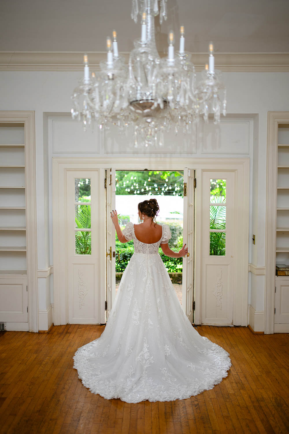 Bride standing in doorway of Duncan Estate Wedding Venue